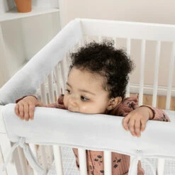 Trend Lab® CribWrap Convertible Crib Long Narrow Rail Cover In White 4 Trend Lab® CribWrap Convertible Crib Long Narrow Rail Cover In White -Trend Lab Shop unnamed file 1337